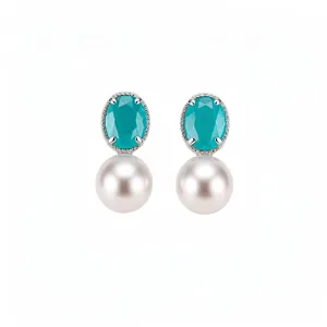 Elegant sterling silver pearl earrings with oval turquoise zirconia in a minimalist style.
