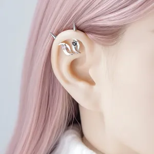 F136 titanium alloy ear piercing jewelry set featuring angel wings and spiked punk studs