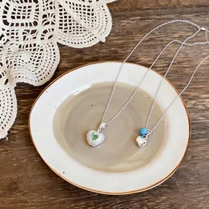 Elegant minimalist silver heart necklaces with zircon apple pendant and blue bead