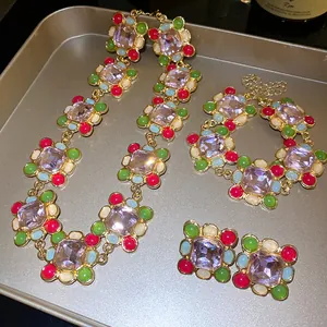 Vintage French style jewelry set featuring colorful resin beads and large pink square gemstones
