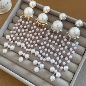 Elegant French vintage style pearl tassel drop earrings in gold and silver finishes