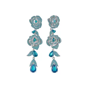 Exquisite blue cubic zirconia flower drop earrings with a heavy craft luxury design