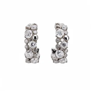 Elegant C-shaped silver stud earrings with multi-size sparkling cubic zirconia stones
