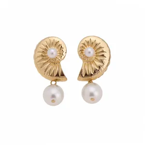 Elegant gold nautilus shell drop earrings with white pearls and silver needles for women.