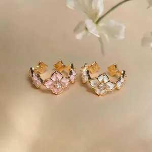 Elegant 18K gold plated open flower rings featuring pink and white enamel with zircons