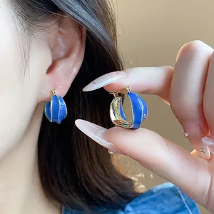 14k gold plated blue enamel irregular hoop earrings featuring a minimalist luxury design