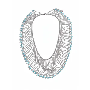 Silver statement fringe necklace with blue crystal beads and multi-layer chain design