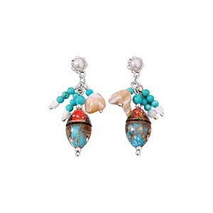 Pendientes vintage de perlas con cuentas turquesas y gotas de cristal con pan de oro.