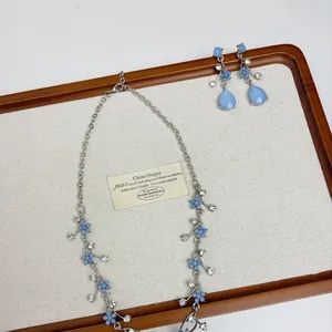 Elegant blue flower rhinestone teardrop pendant necklace and earrings jewelry set