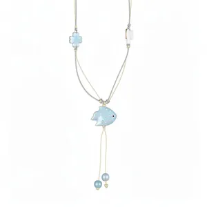 Sweet ceramic fish pendant necklace featuring blue flower and white bear charms for women
