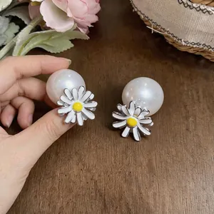 Elegant daisy flower stud earrings with large white pearl backs