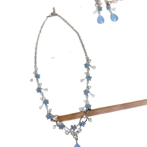 Elegant blue floral necklace and earring set with rhinestone waterdrop pendant