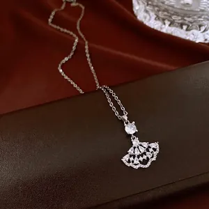 Elegant silver-toned fan-shaped necklace with shimmering white zircon stones for women