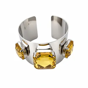 Vintage silver-tone wide cuff bracelet featuring three large square yellow crystal stones