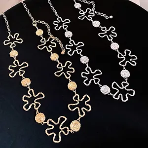 Ceinture chaîne de taille élégante en métal à fleurs évidées dorée et argentée