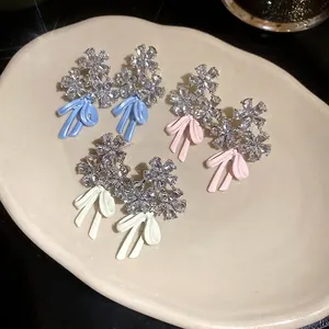 Exquisite flower and bow drop earrings with sparkling zirconia and silver needles