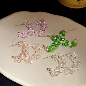 Elegant handmade beaded C-shaped hoop earrings with glass pearls in four trendy colors