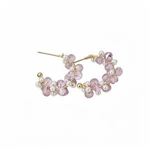 Handmade C-shaped hoop earrings featuring light purple glass beads and white pearls