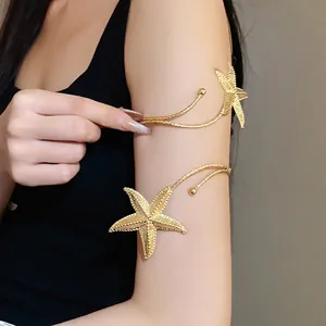 Elegant golden starfish arm cuffs with vintage wrinkled metallic texture for women