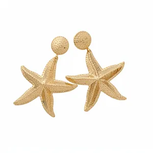 Vintage gold starfish drop earrings with a luxurious textured finish for an elegant beach style