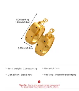 Detail view of matte gold brushed hoop earrings with dimensions and specifications