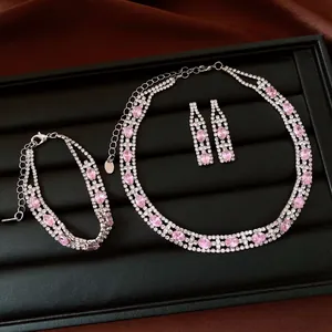 Elegante set di gioielli vintage con zirconi rosa e strass, collana bracciale e orecchini