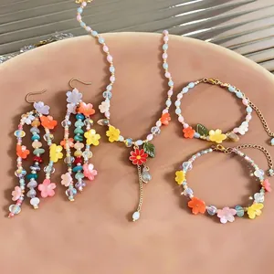 Handmade exquisite resin flower jewelry set including beaded necklace, bracelets and earrings