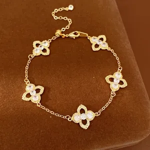 Light Luxury Hollow Four-Leaf Clover Bracelet Copper Zirconia Inlaid Gold Plated Lucky Flower Charm Bracelet For Women Jewelry