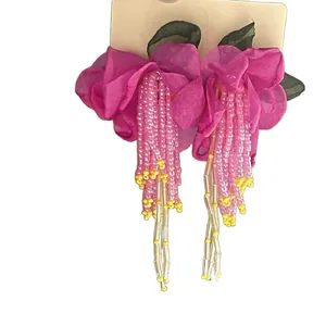 Exaggerated pink fabric flower tassel earrings with silver needles for vacation style