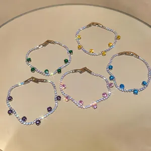 Detail of colorful dopamine zircon bracelets with sparkling light on mirror surface