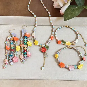Colorful resin flower beaded jewelry set including necklace, earrings and bracelets details