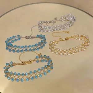 Elegant handmade hollow-out beaded bracelets for women with blue and clear crystal beads