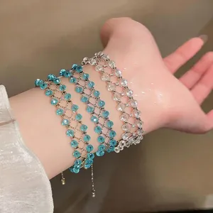 Elegant handmade hollow mesh beaded bracelets in blue and white for stylish women