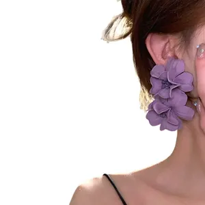 Elegant purple fabric flower drop earrings with a sweet forest holiday aesthetic