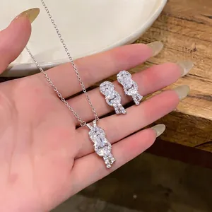 Elegant silver zircon horseshoe pendant necklace and earring jewelry set for women