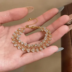 Elegant handmade gold hollow mesh bracelet with clear quartz beads for stylish women