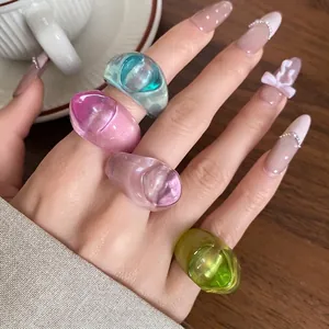 Colorful irregular resin rings set with transparent dopamine aesthetic style