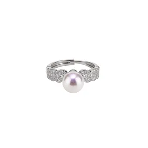 Elegant French style open ring with central pearl and sparkling zircon flower petals