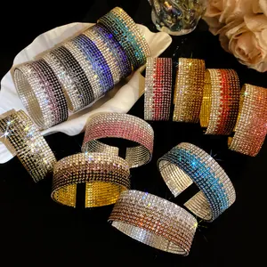 Detail view of multi-layer rhinestone cuff bracelets with sparkling gradient colors and shine
