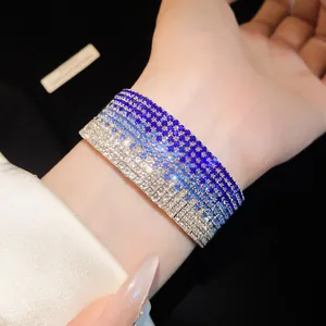 Close-up of elegant gradient blue and silver multi-strand rhinestone stretch bracelet