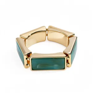 Vintage resin rectangular segment stretch bracelet in gold and teal green finish.
