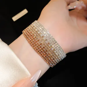 Macro detail of a luxurious multi-layer gradient rhinestone elastic cuff bracelet