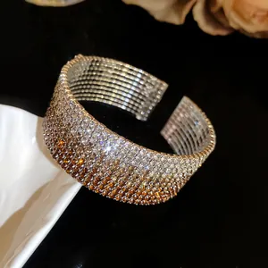 Detailed view of luxury sparkling multi-layer gradient rhinestone stretch open cuff bracelet