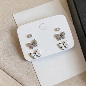 14K gold plated stud earrings set featuring elegant bow and butterfly zircon designs