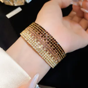 Detailed view of the gradient rhinestone multi-layer stretch bracelet on wrist