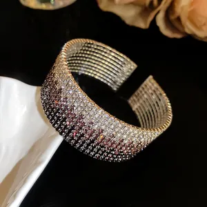 Close-up of elegant gradient rhinestone multi-layer elastic cuff bracelet