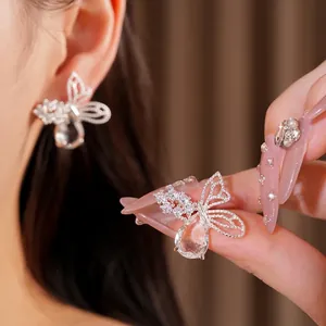 Elegant silver needle butterfly stud earrings with sparkling zircon and teardrop stones