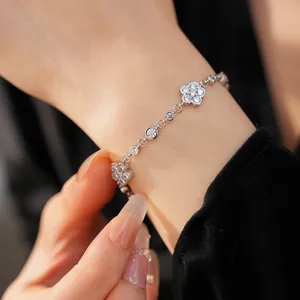Detailed macro shot of a silver flower bracelet with sparkling cubic zirconia stones