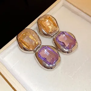 Elegant square crystal stud earrings with silver needle in jewelry box