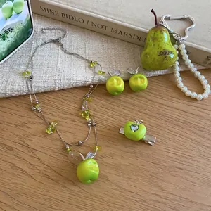 Forest style green apple jewelry set with beaded necklace earrings and hair clip